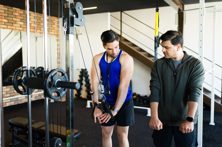 Man working out with cable machine